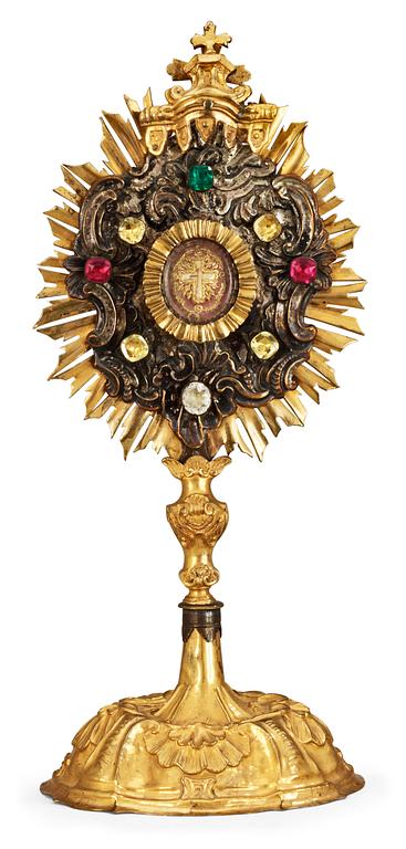 An 18th century gilt and silvered brass monstrance.