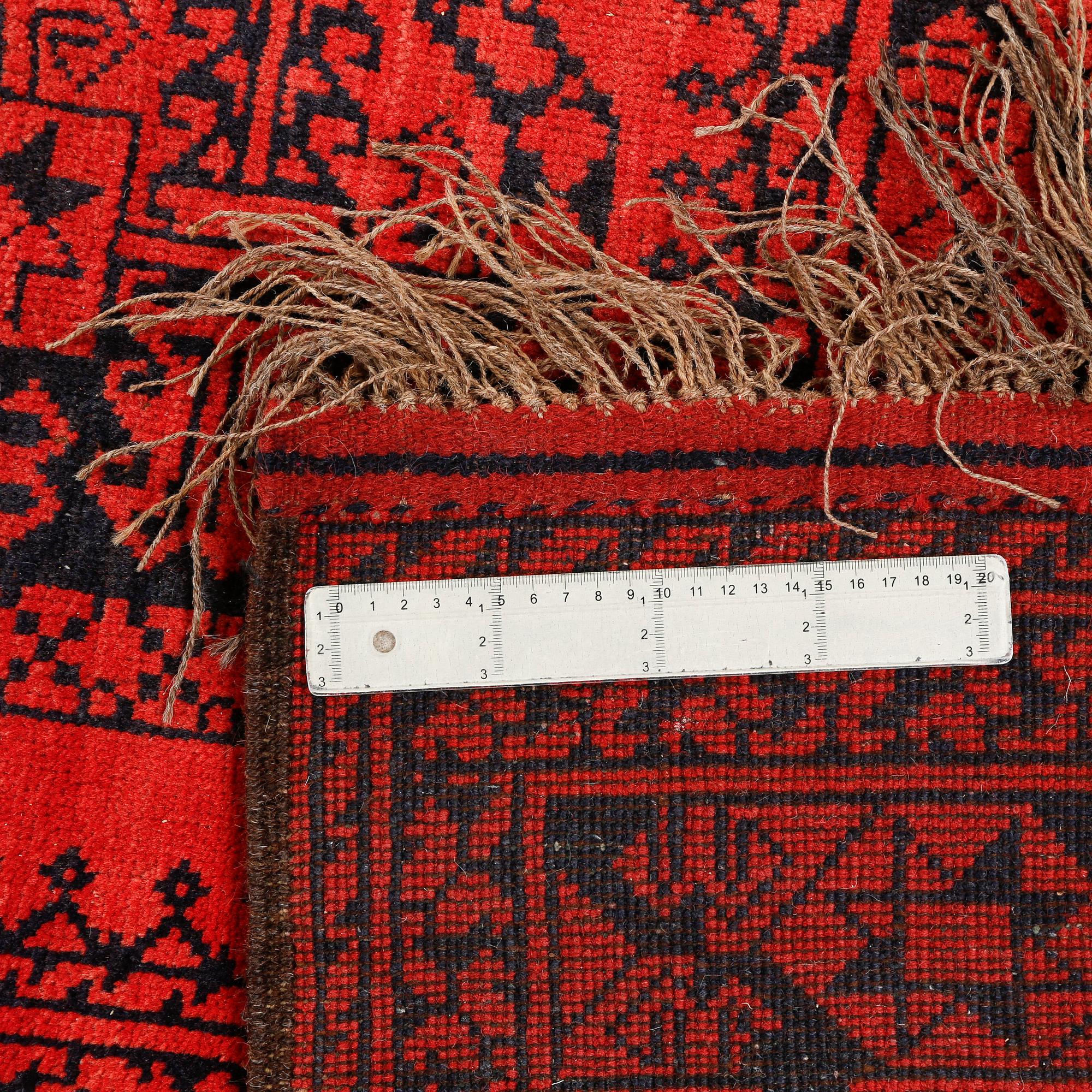 An Afghan rug, old/semi antique, 288 x 212 cm.