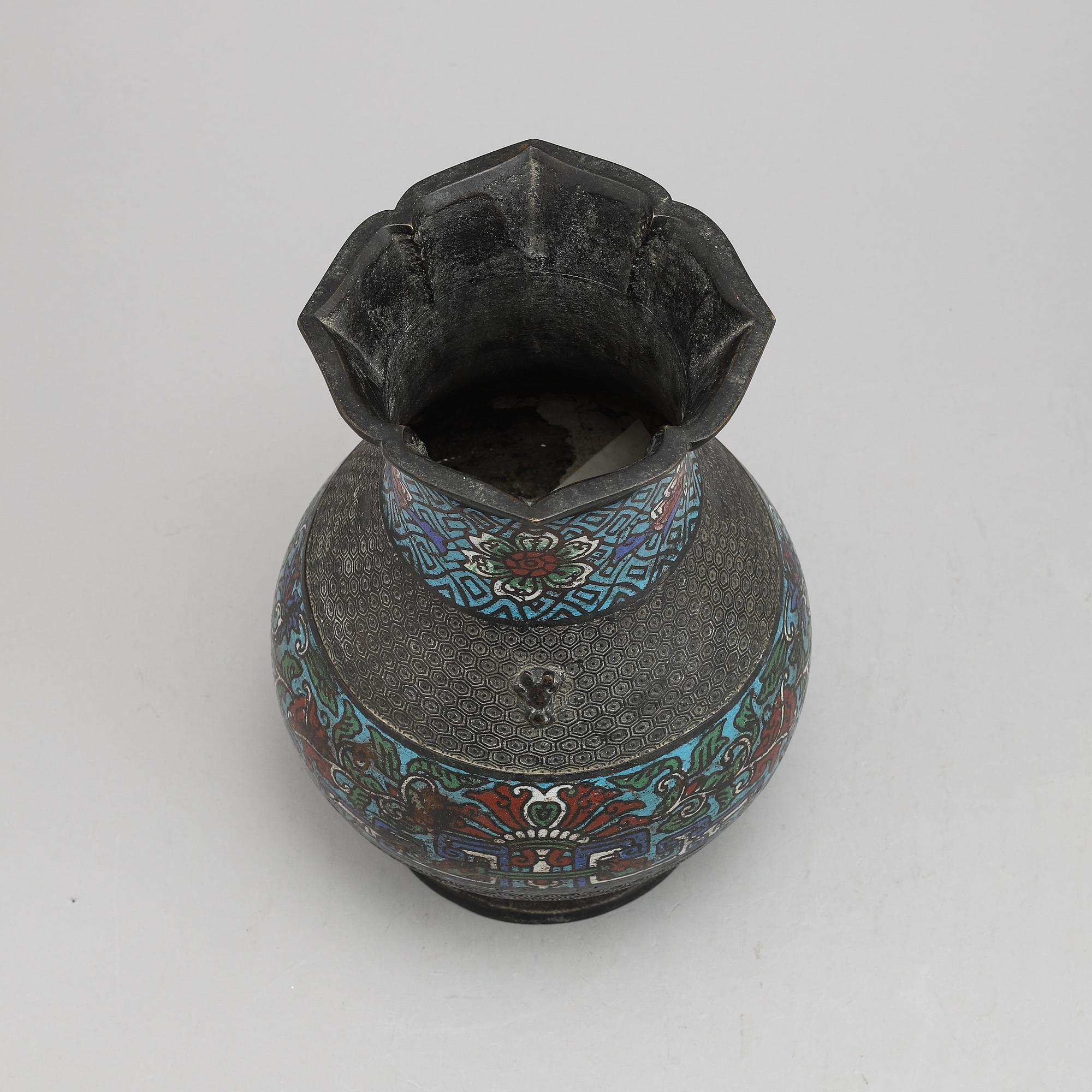 A Chinese bronze and cloisonné vase, around the year 1900.