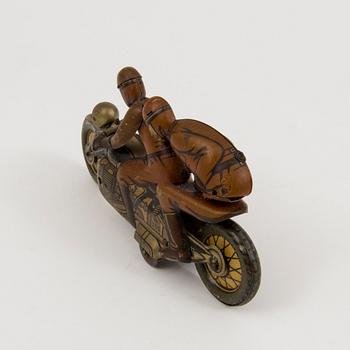 A tinplate Kellerman military motorcycle no 353, Germany, 1930s.