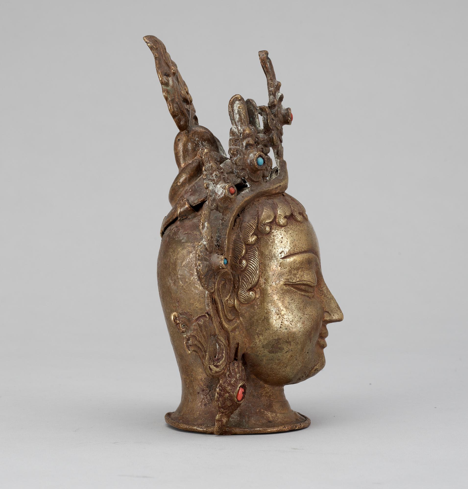 BUDDAHUVUD, brons med stenar. Troligen Nepal.