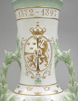 A Karl Lindström porcelain vase, decorated with the portrait of King Oscar II with his motto, Rörstrand 1897.