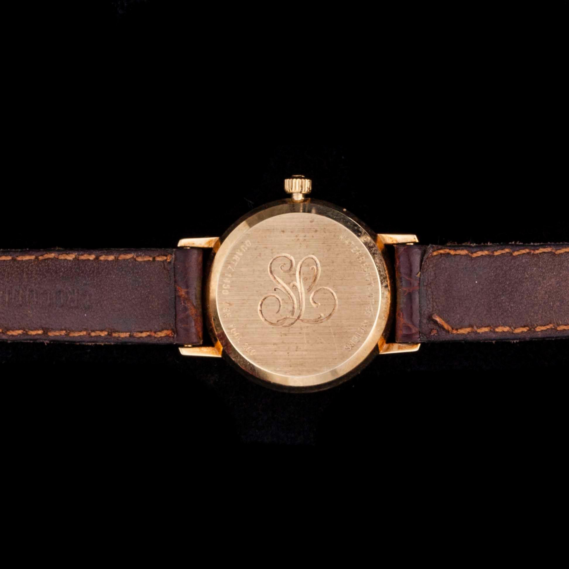 ARMBANDSUR, dam, Omega, guld, läderarmband, original etui.