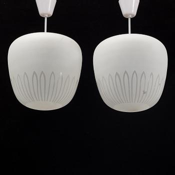 A pair of 1940's Swedish medern ceiling lamps.