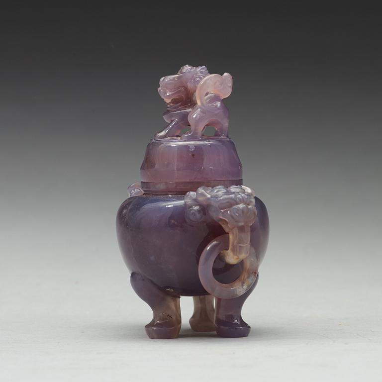 An amethyst tripod censer with cover, China, early 20th Century.