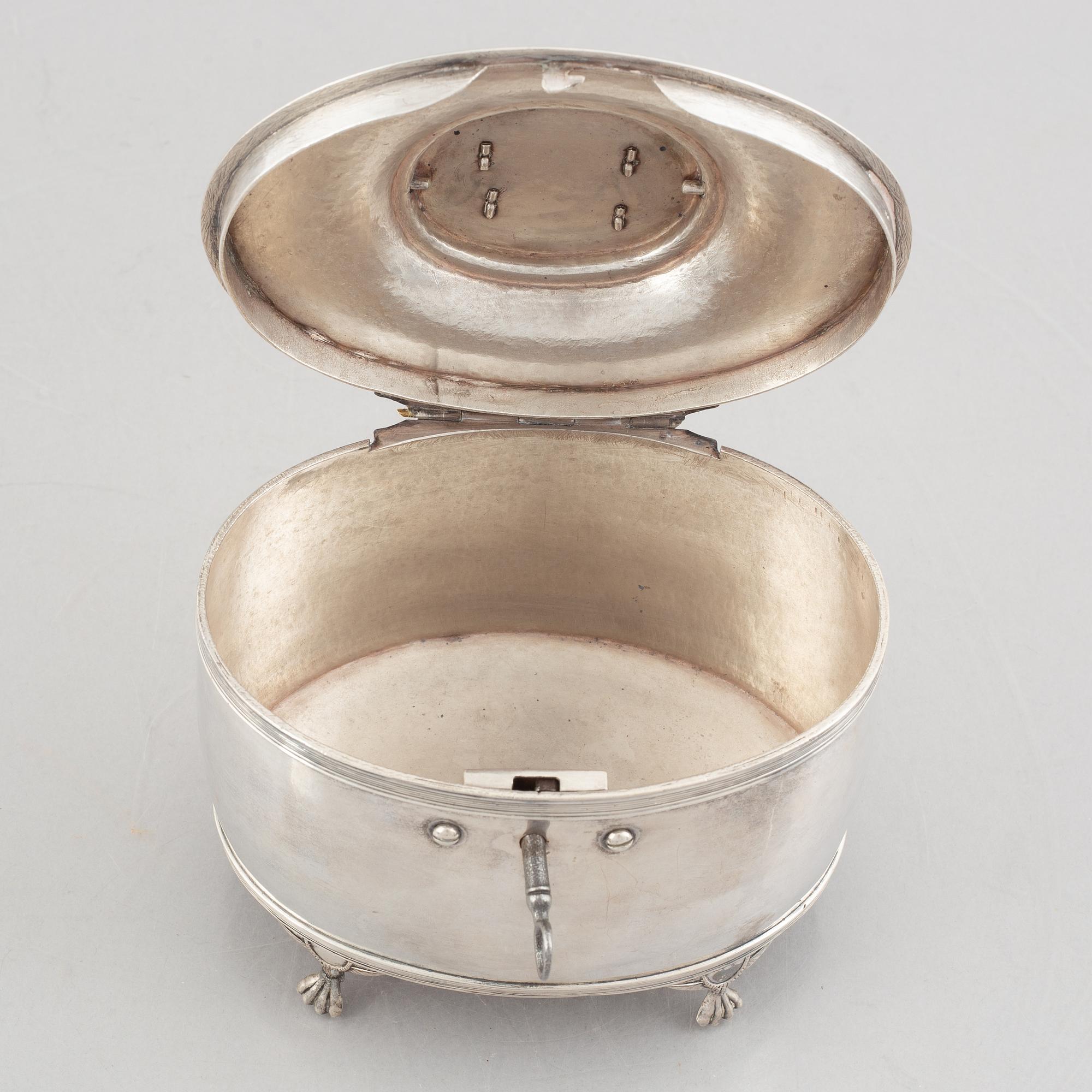 An Empire silver sugar box, mark of Gustaf Folcker, Stockholm 1817.