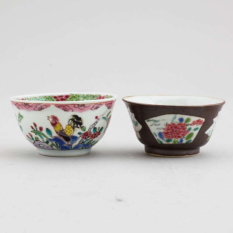 A famille rose butter tureen with cover and two cups with three odd stands, Qing dynasty, Qianlong (1736-95).