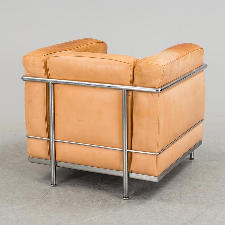 A 'LC3' easy chair by Pierre Jeanneret & Charlotte Perriand. Le Corbusier for Cassina.