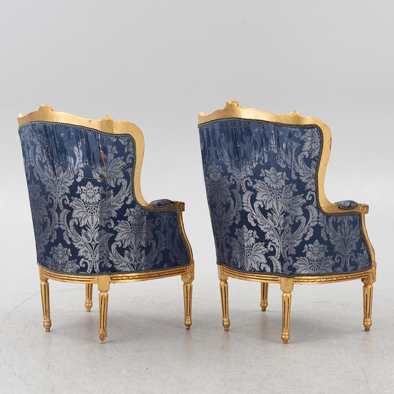 A pair of Louis XVI style armchairs, late 20th Century.