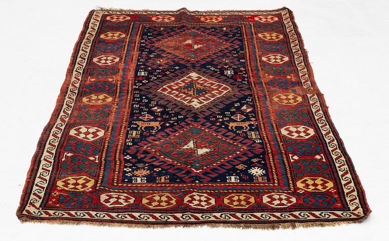 A antique Kazak gallery vcarpet, ca 240 x 120 cm.