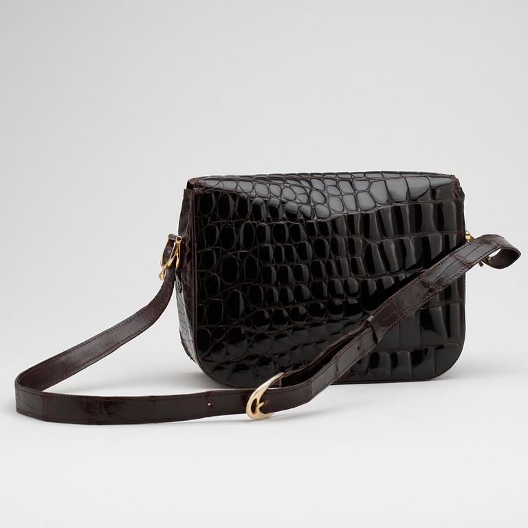 CÉLINE, a brown crocodile embossed leather shoulder bag.