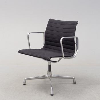 An 'Aluminum group arm chair by Charles & Ray Eames, for Vitra.