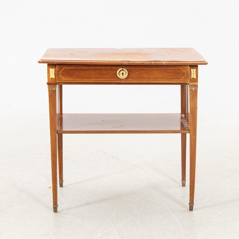 An Empire style mahogany table first half of the 20th century.