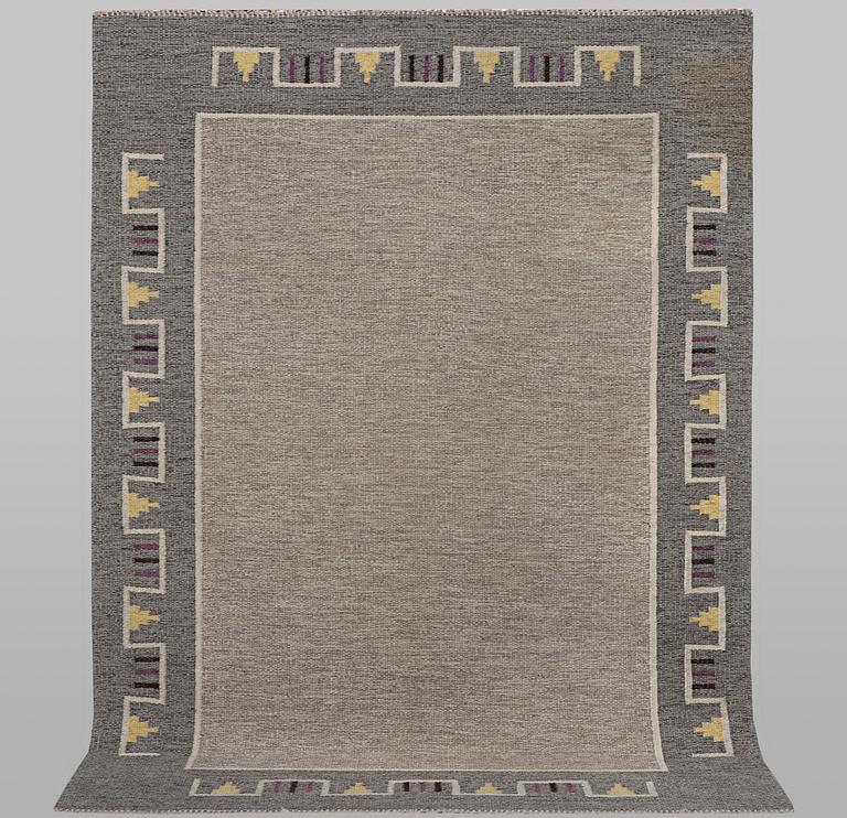 A carpet, flat weave, ca 240 x 165 cm.