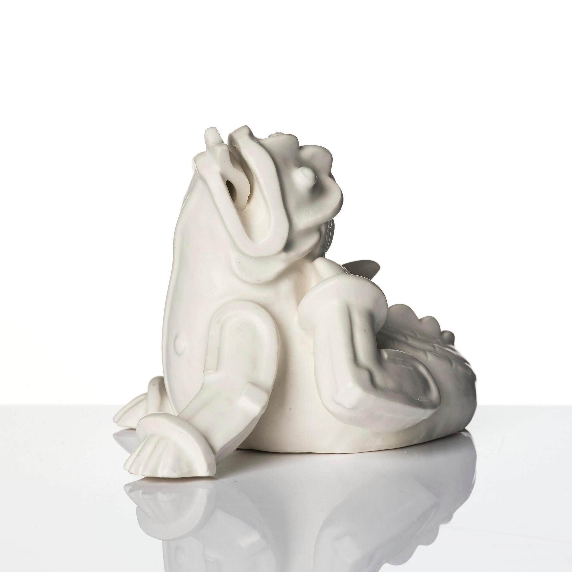 Wilhelm Kåge, a set of two stoneware sculptures of dragon puppies, Gustavsberg, Sweden 1940-50's.