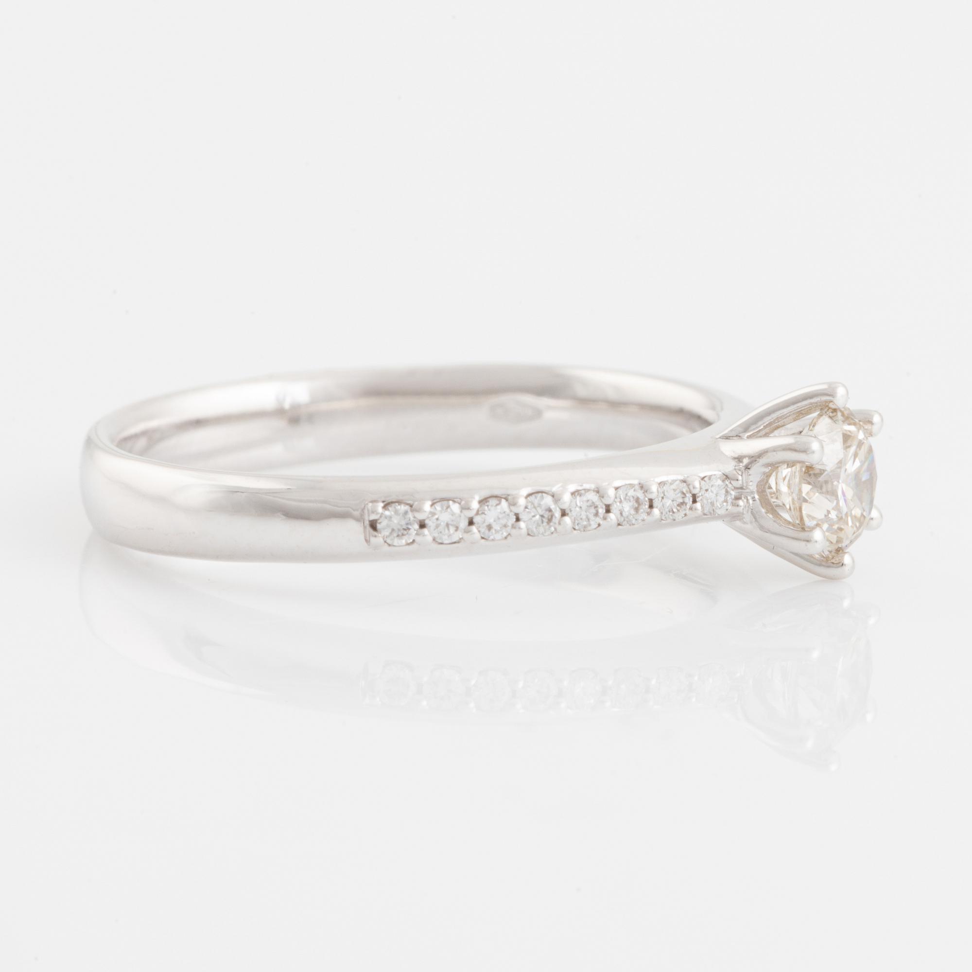 Brilliant cut diamond solitaire ring, with IGI report.