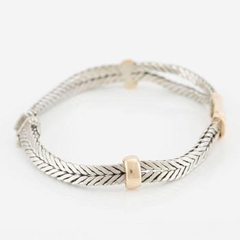 Armband, 18K guld och vitguld med briljantslipade diamanter.