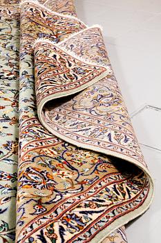 A Keshan rug, 412 x 305 cm.