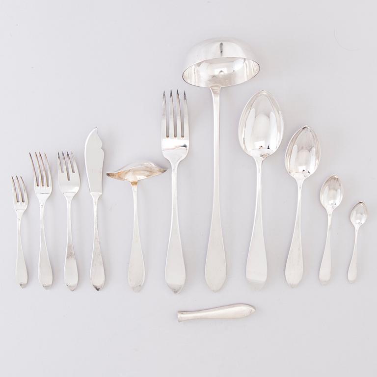 A 1920s 88-piece set of silver cutlery and 12 knife handles, Warsaw Poland.