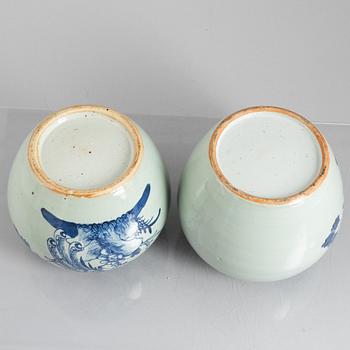Two similar Chinese porcelain vases with covers, late 19th Century.