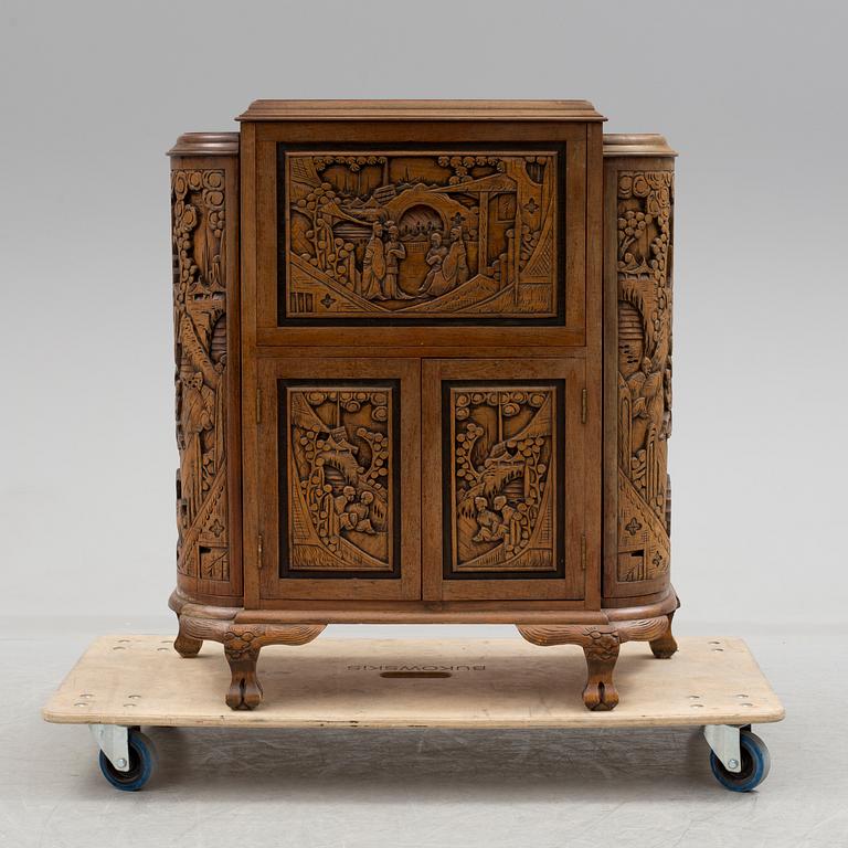 a chinese style bar cabinet from the late 20th century.