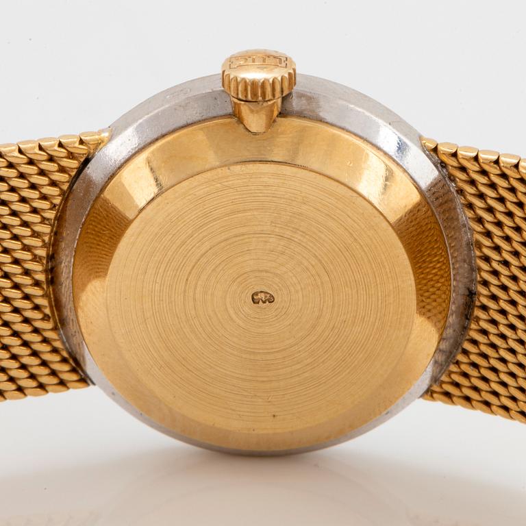 A Chopard wrist watch in 18K gold set with eight-cut diamonds.