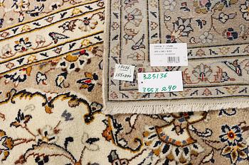 A Keshan carpet, c. 355 x 240 cm.