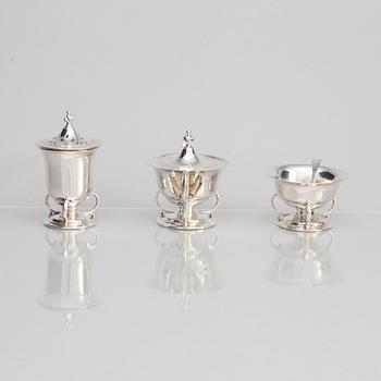 Josiah Williams & Co, an eight piece silver cruet set, London 1904.