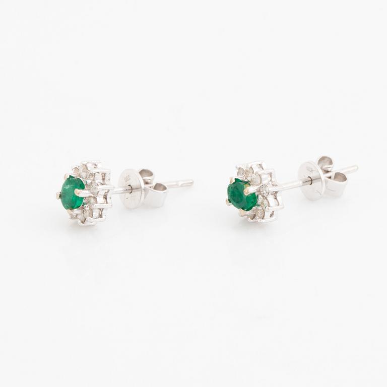 Emerald and brilliant cut diamond earrings.
