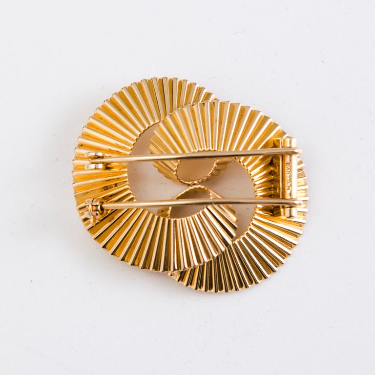 CARTIER, A 14K gold brooch . Marked 289C.