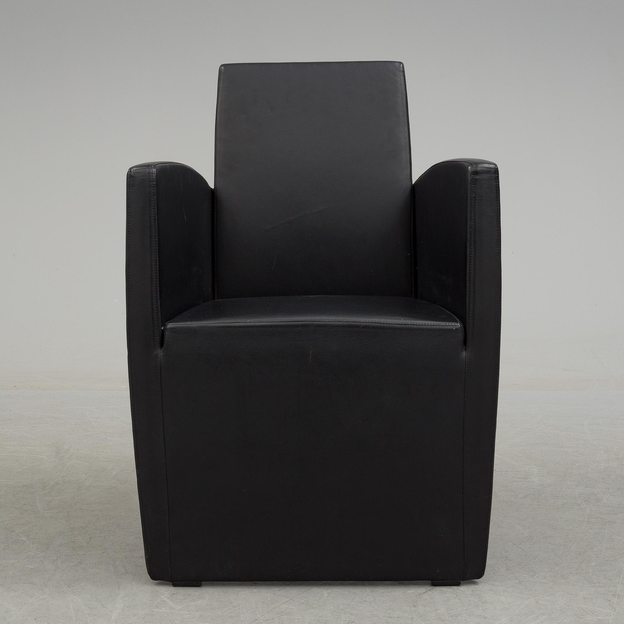 A Philippe Starck 'J Serie Lang' black leather and cast aluminium lounge chair, by Aleph, Italy.