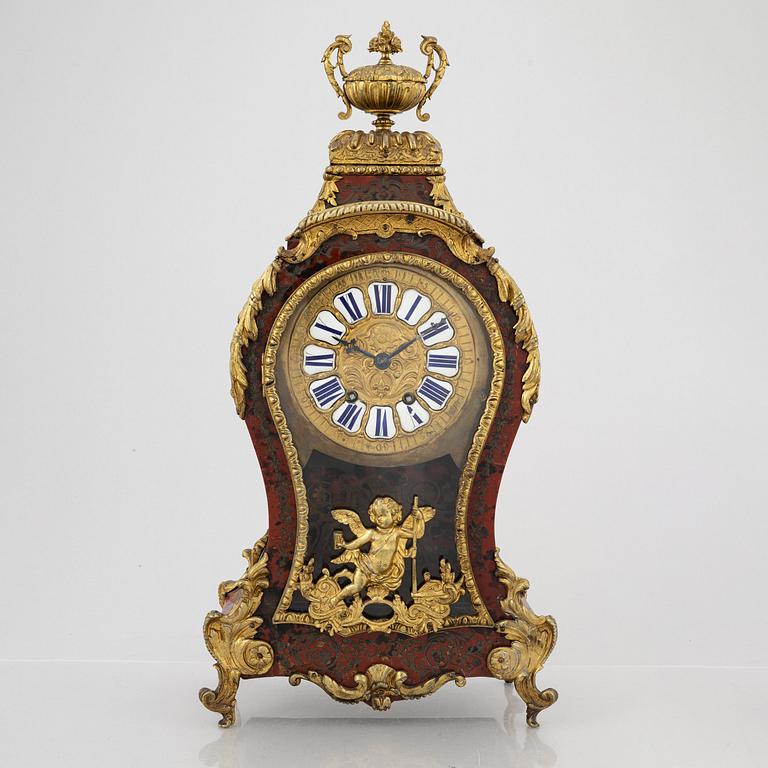 A Louis-XV style mantle clock, France, 19th century.