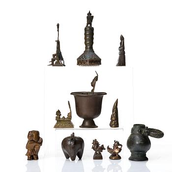 A small collection of bronzes, China, Burma and India. (11 pieces).