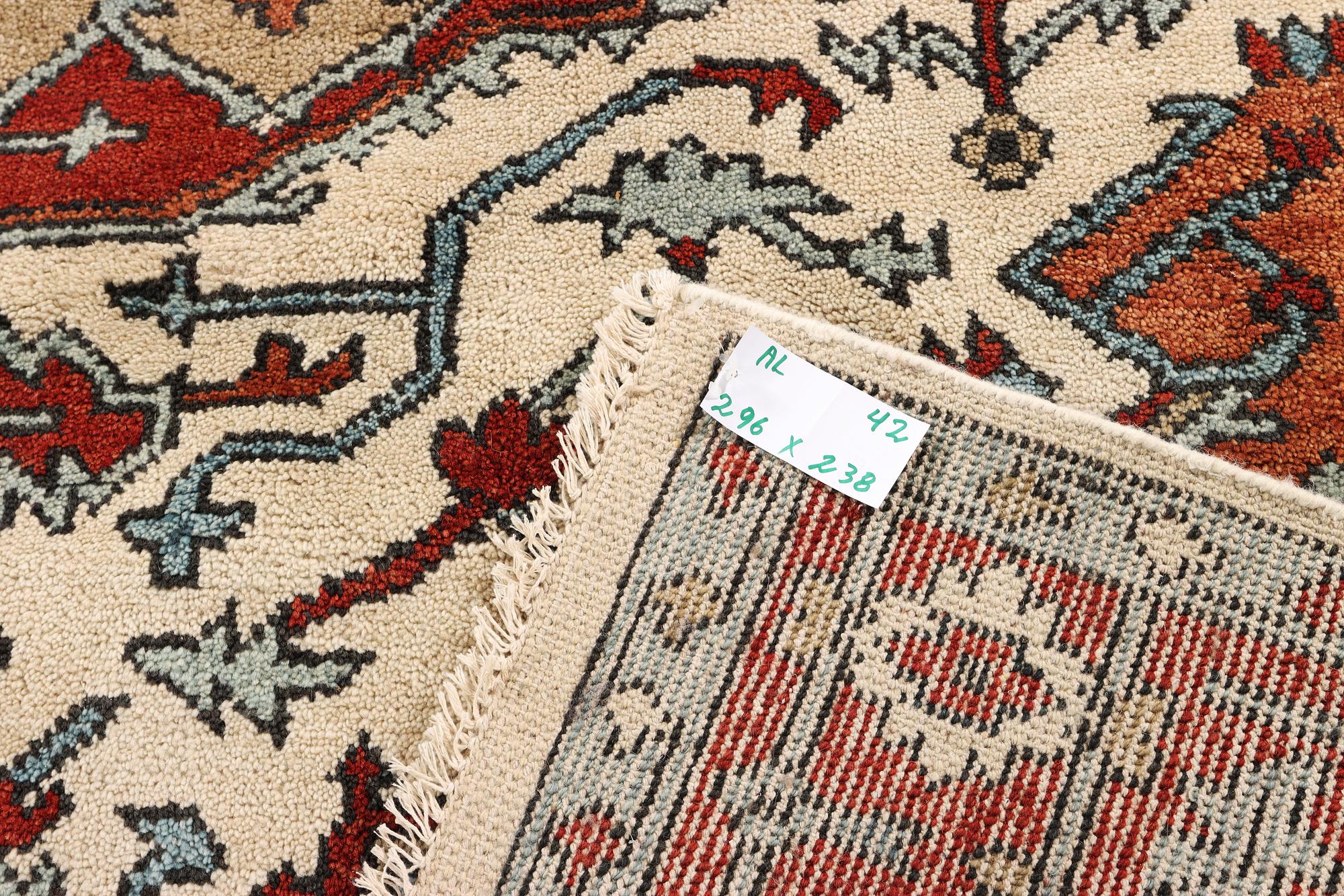 An oriental carpet, c. 296 x 238 cm.