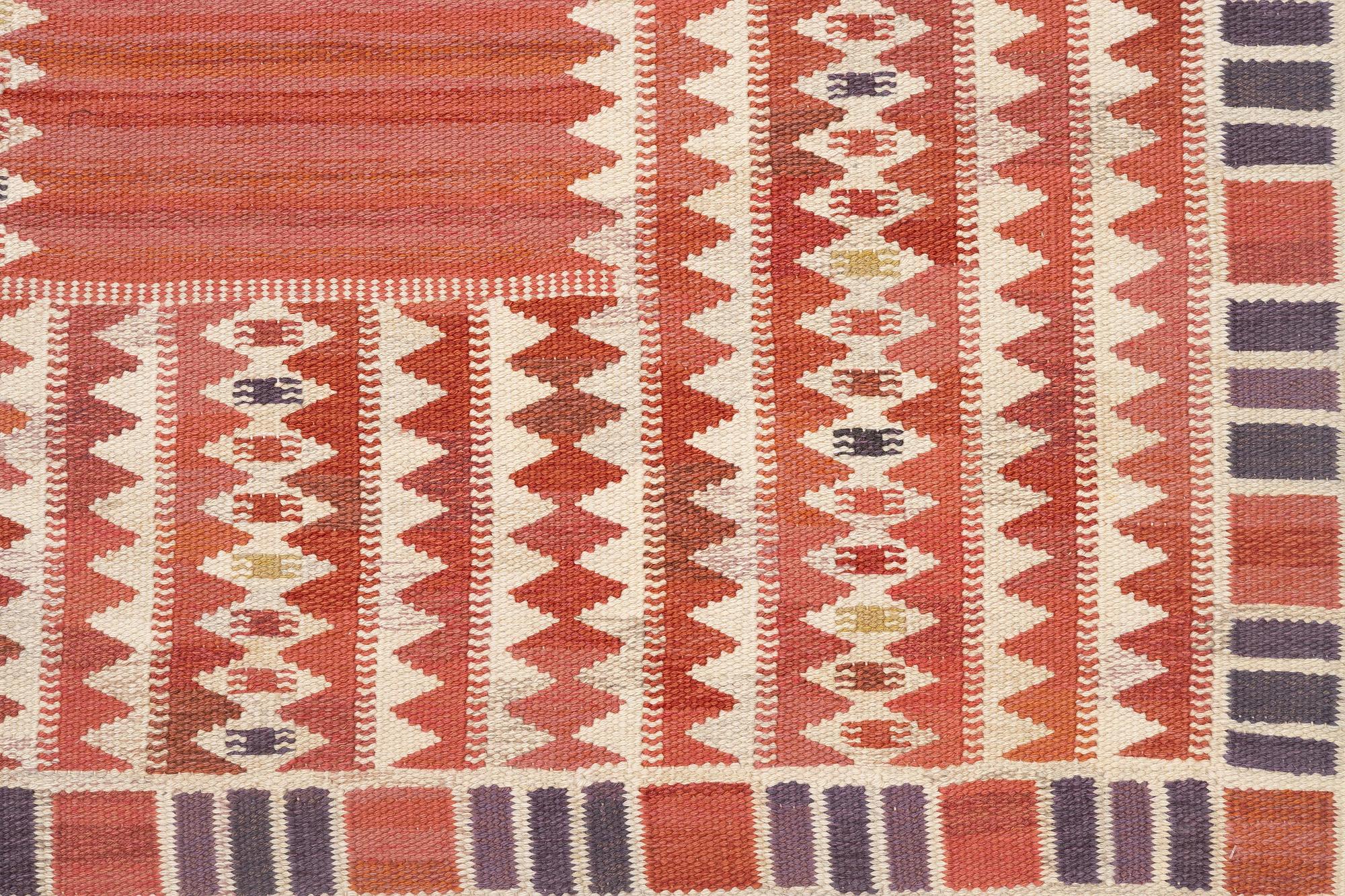 Barbro Nilsson, a carpet, 'Salerno röd', flat weave, c. 261 x 193 cm, signed AB MMF BN.