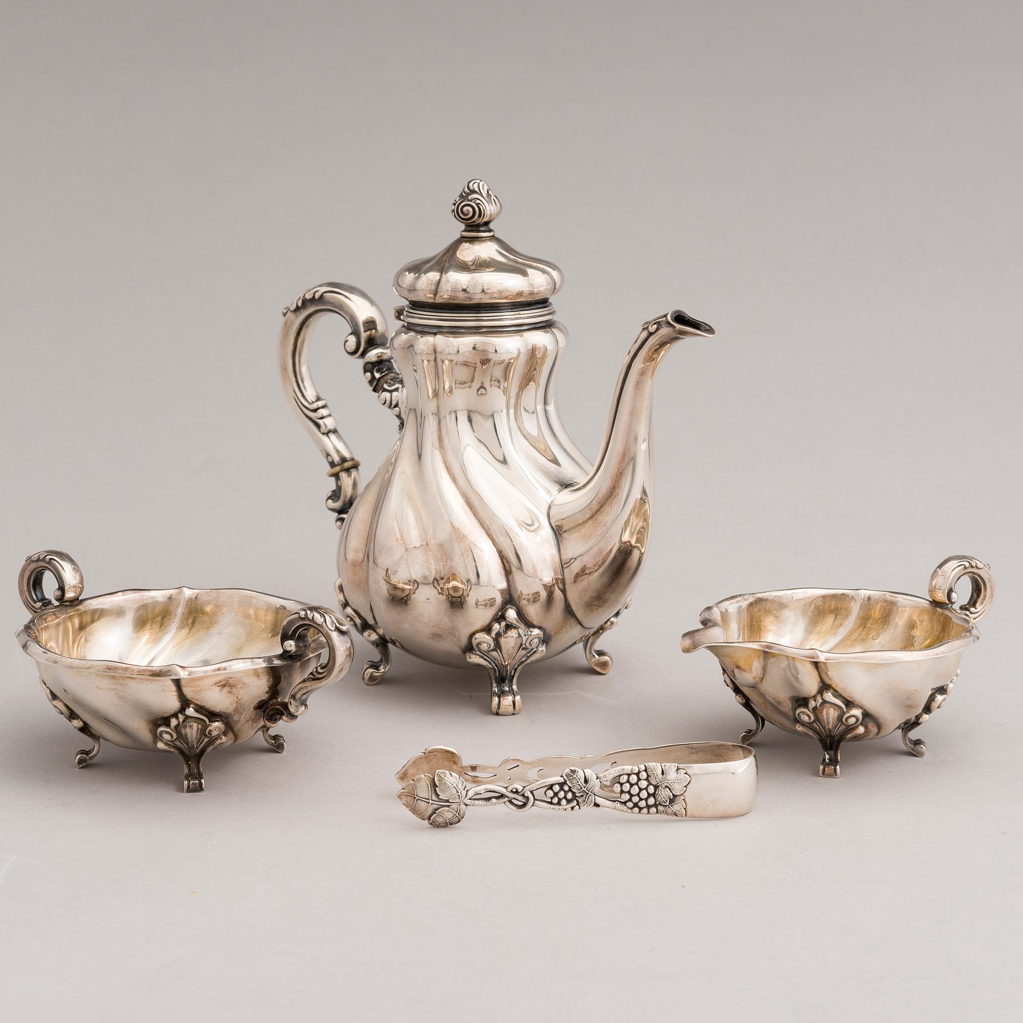 A silver sugar tong and a 3-piece silver coffee set, mark of Juho H. Pekuri, Oulu 1931 and Finnish import marks 1938.