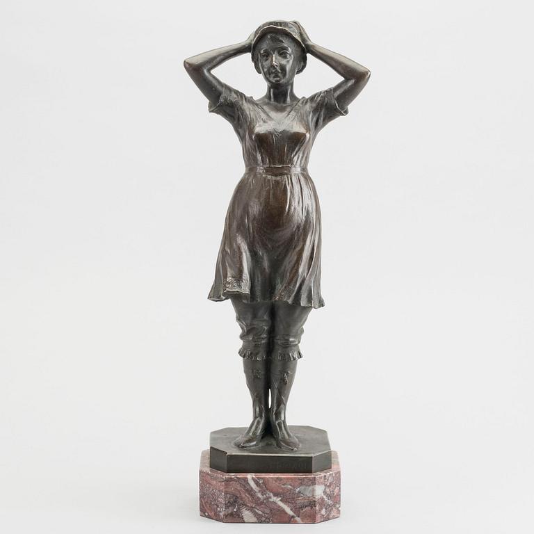 HUGO HECK, a signed and dated bronze sculpture.