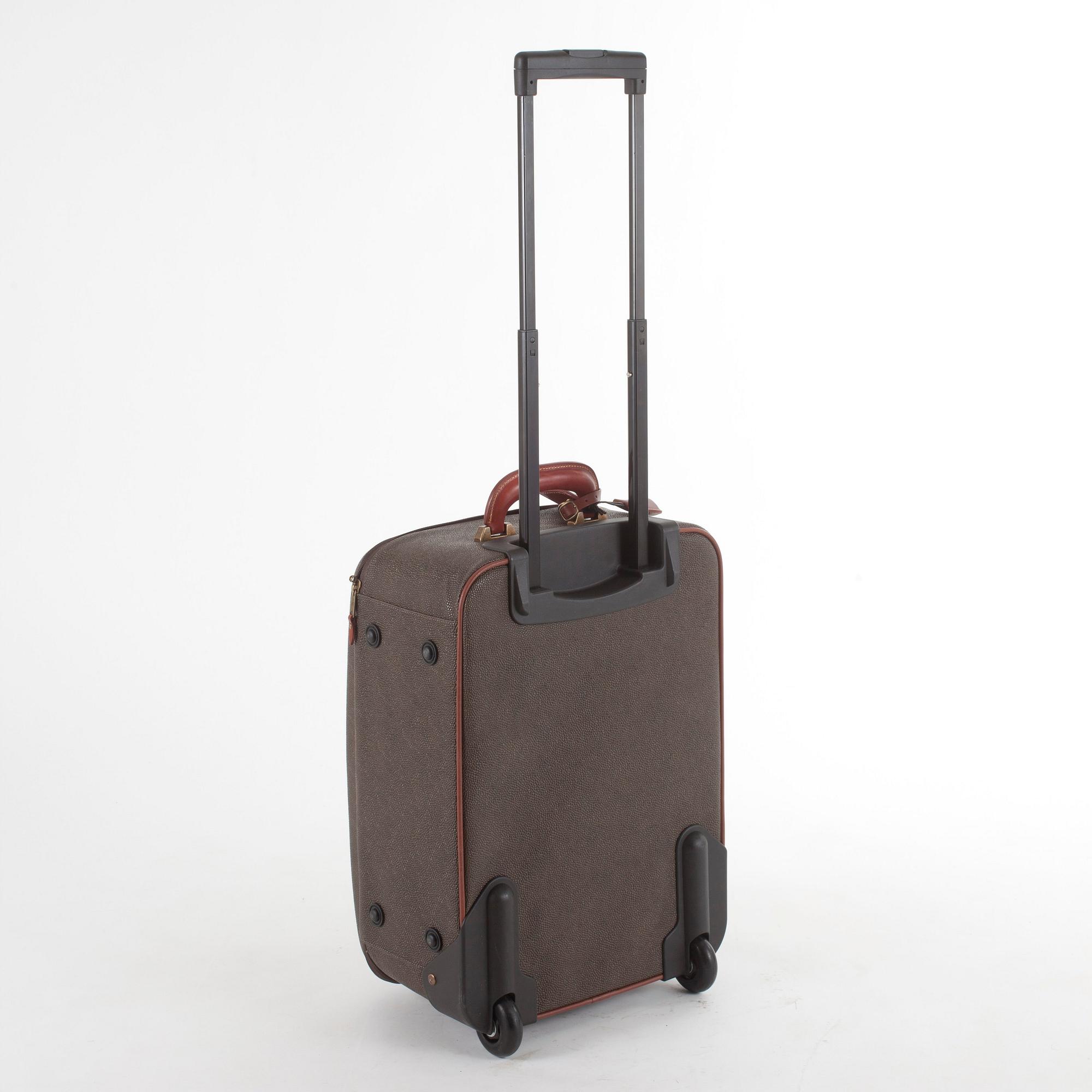 MULBERRY, a green leather suitcase.