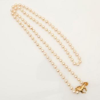 Ole Lynggaard, hänge, 18K guld med diamant samt pärlcollier.