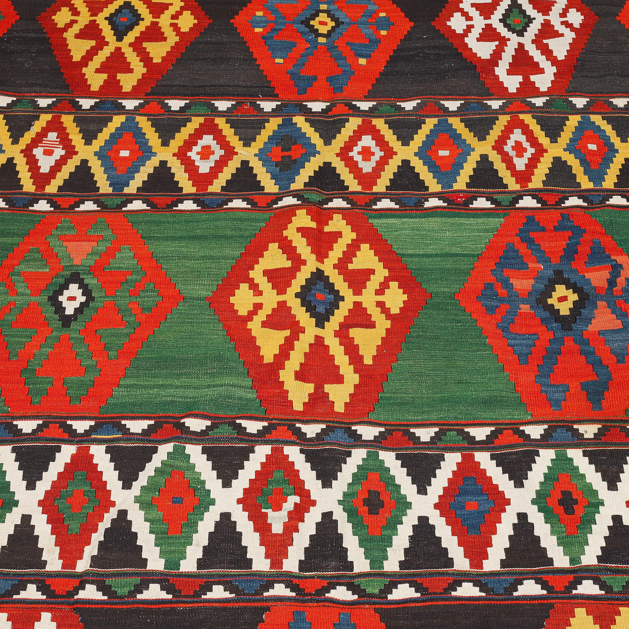 A carpet, Antique Caucasian kilim, ca 252 x 195 cm.