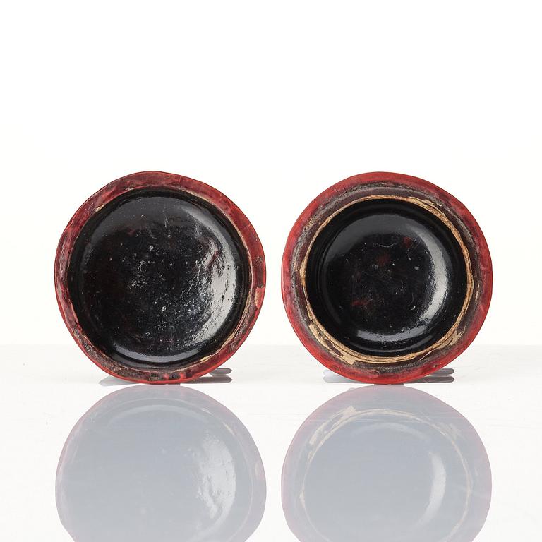 A Chinese red lacquer box with cover and a sculptured nephrite plaque, 20th Century.
