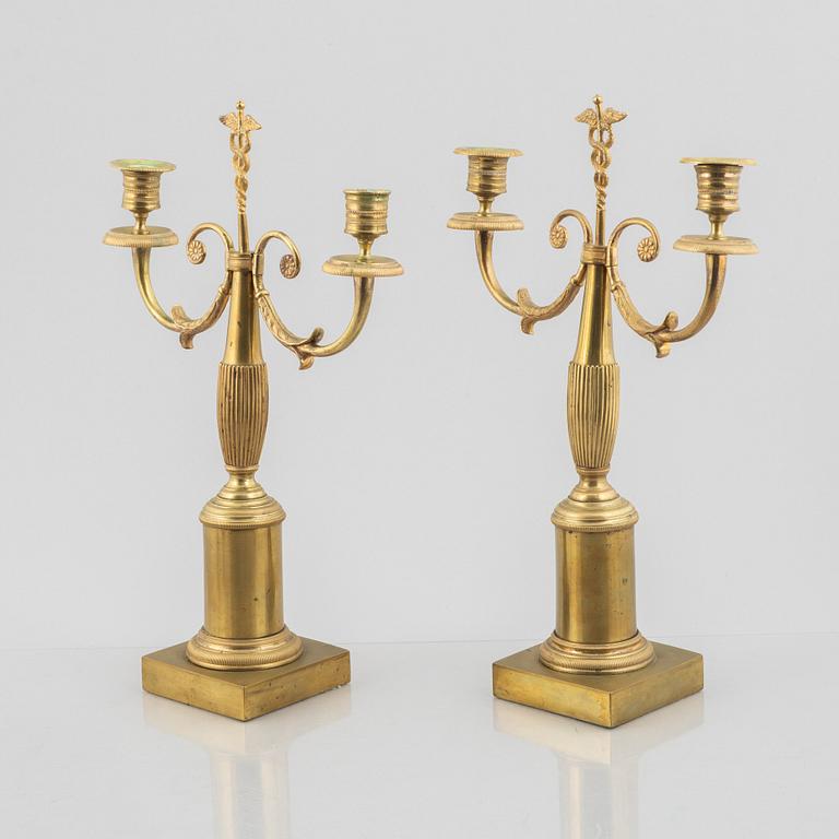 A pair of brass candelabra, first half/mid 19th century.