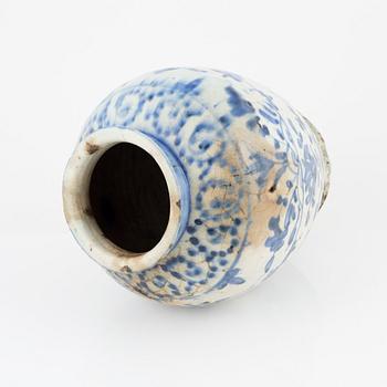 A Persian earthenware vase, Qajar, 19th Century.