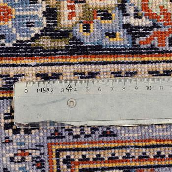 A Keshan rug, 363 x 244 cm.