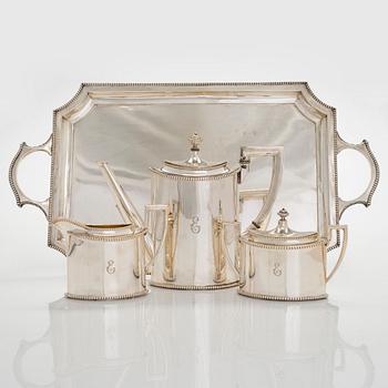 An early 20th century 4- piece sterling silver empire coffee set, C.G. Hallbergs Guldsmeds AB, Stockholm.
