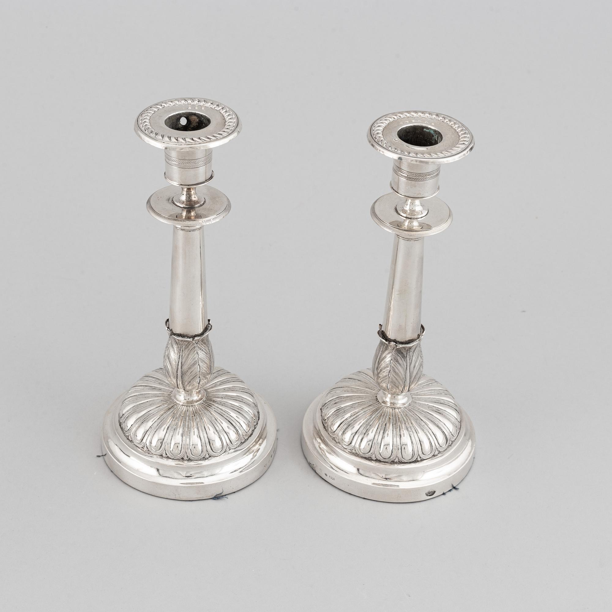 Gustaf Möllenborg, a pair of silver empire candlesticks, Stockholm 1829.