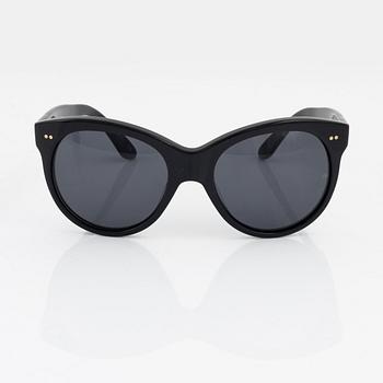 Oliver Goldsmith, a pair of black "Manhattan" sunglasses.