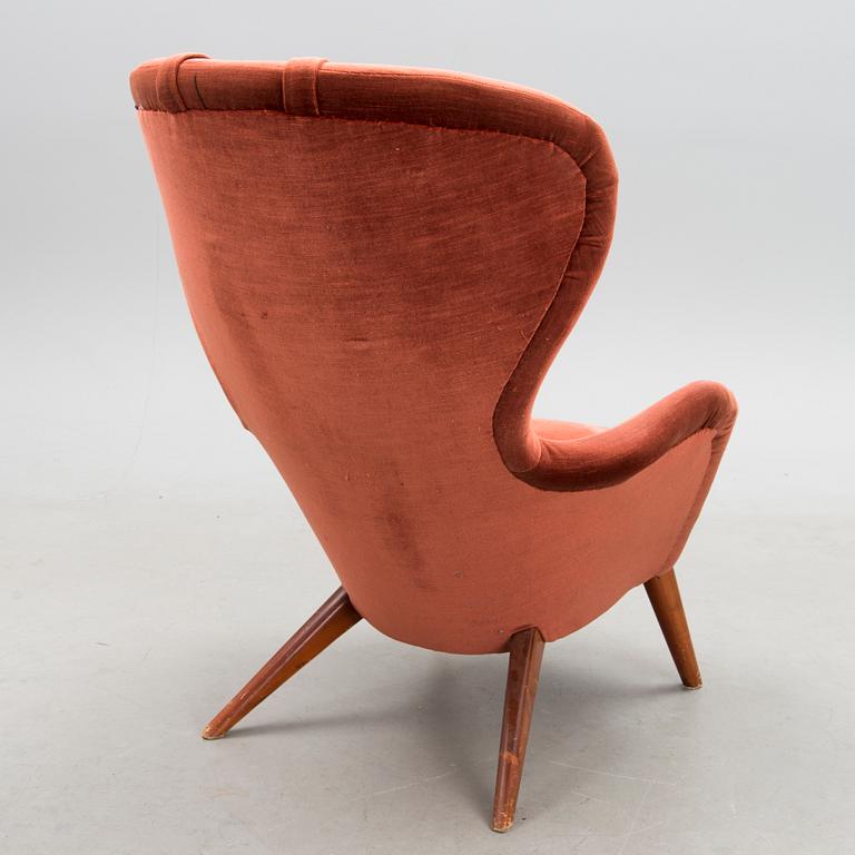 A mid-20th century 'Siesta' armchair for Puunveisto Oy - Träsnideri Ab, Finland.