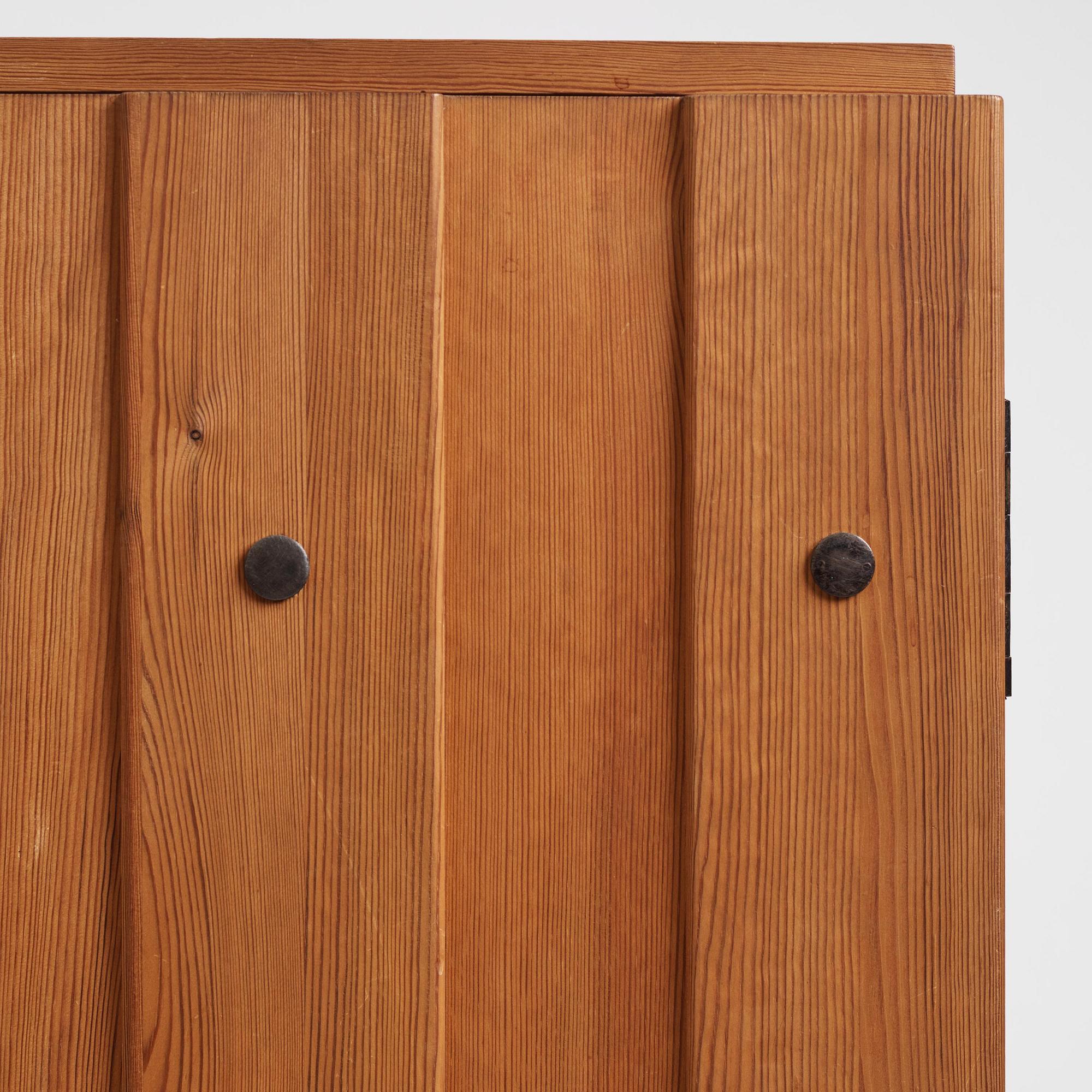Axel Einar Hjorth, a stained pine "Lovö" cabinet, Nordiska Kompaniet, Sweden, 1930s.