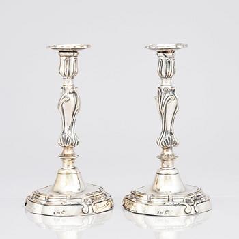 A pair of Rococo candlesticks by Stephen (Friedrich) T. Lemair, (privilge in Stockholm 1762), 1763.